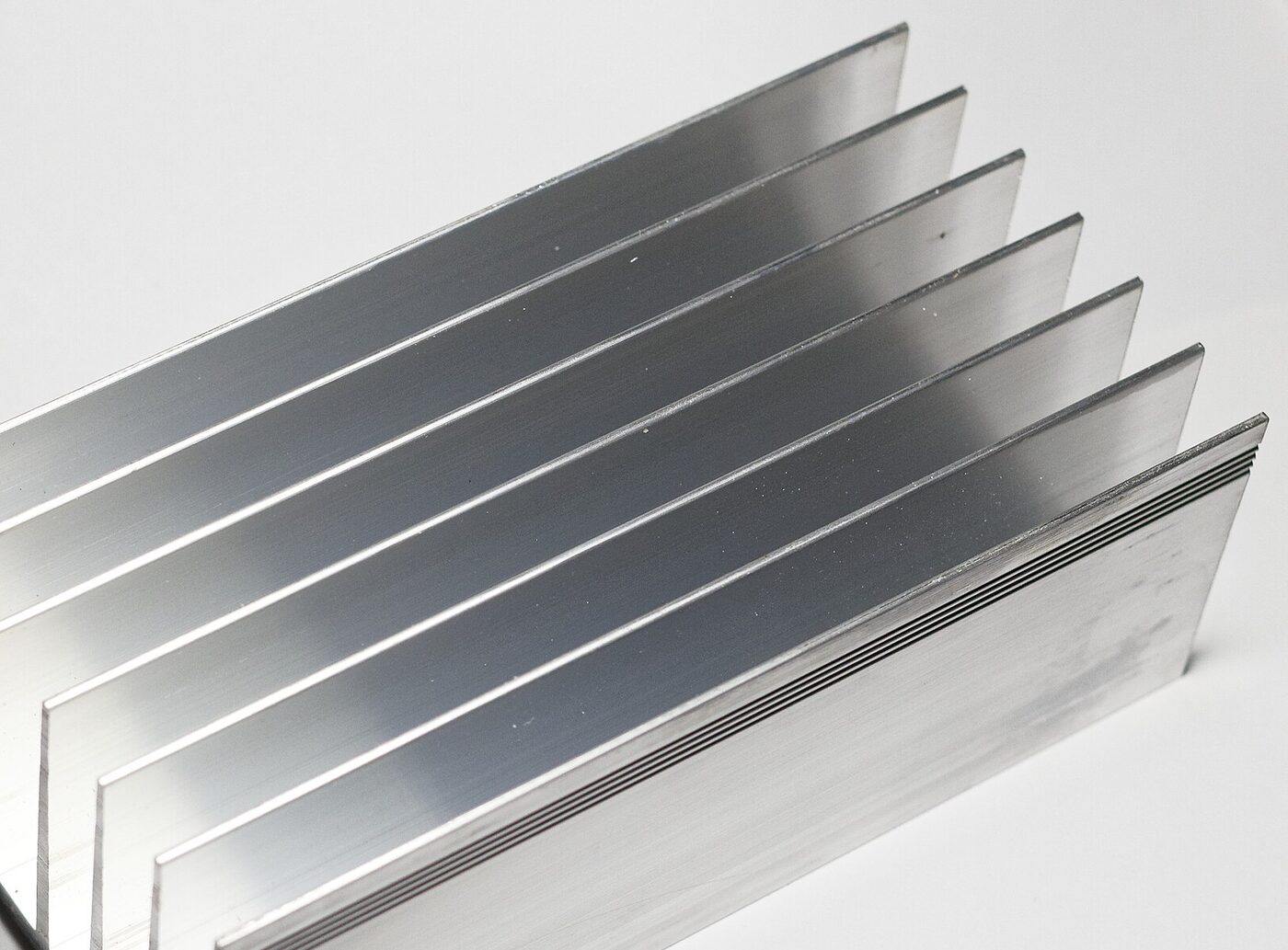 Finned aluminum extrusion viewed along its length